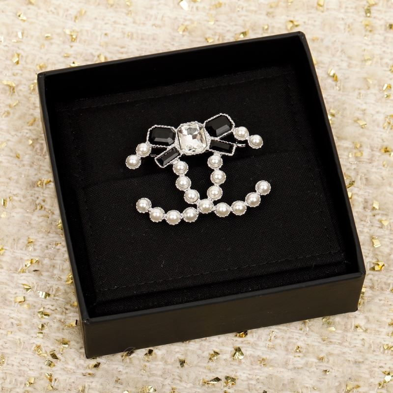 Ch*el brooches